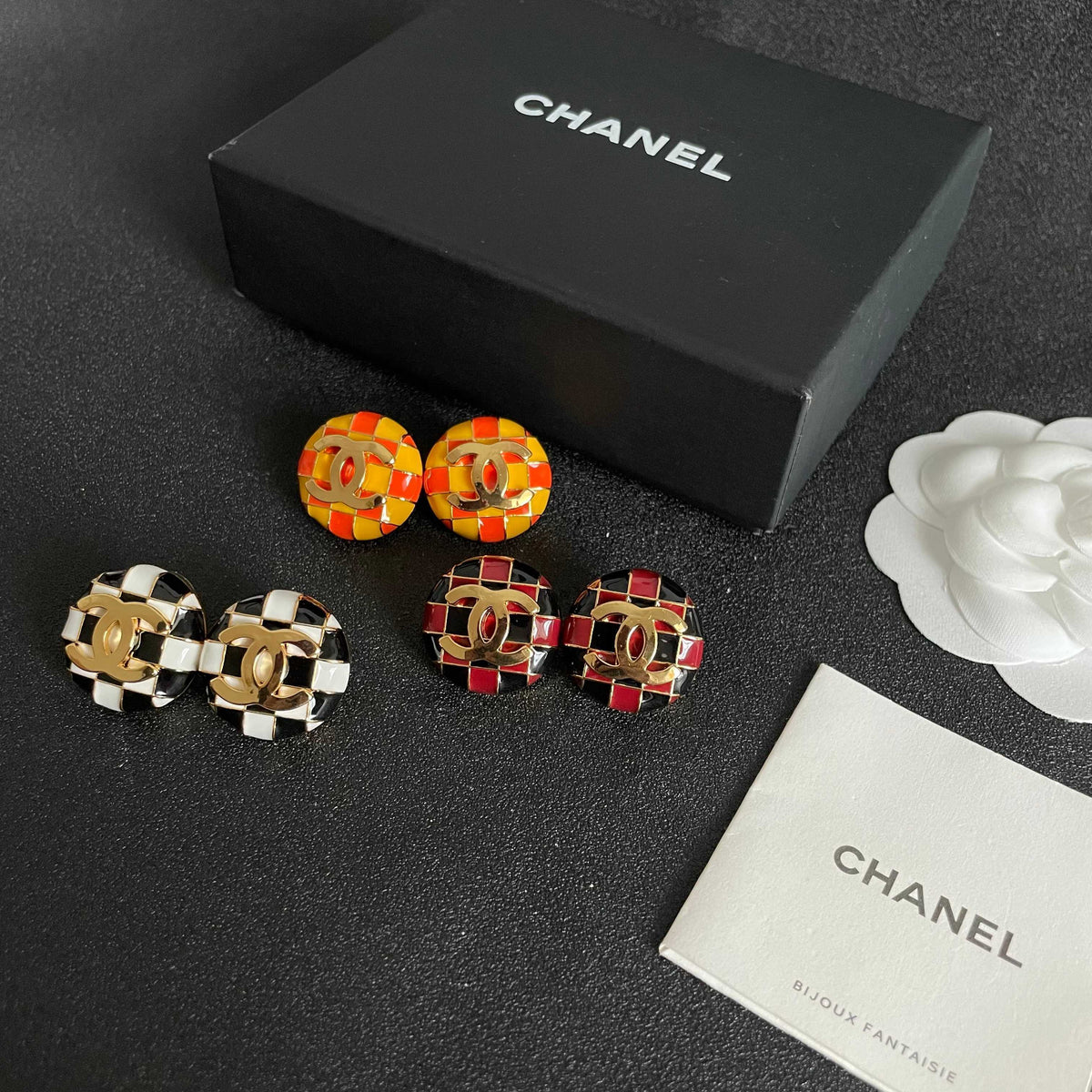 Martin Graham stud earrings in polished metal-tone – side detail