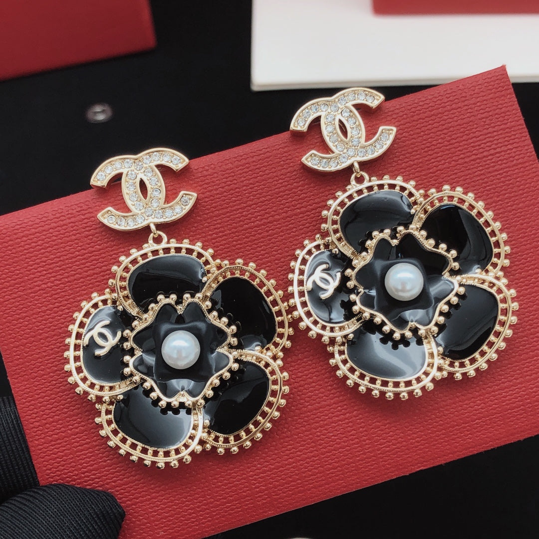 Martin Graham stud earrings in polished metal-tone – main product view