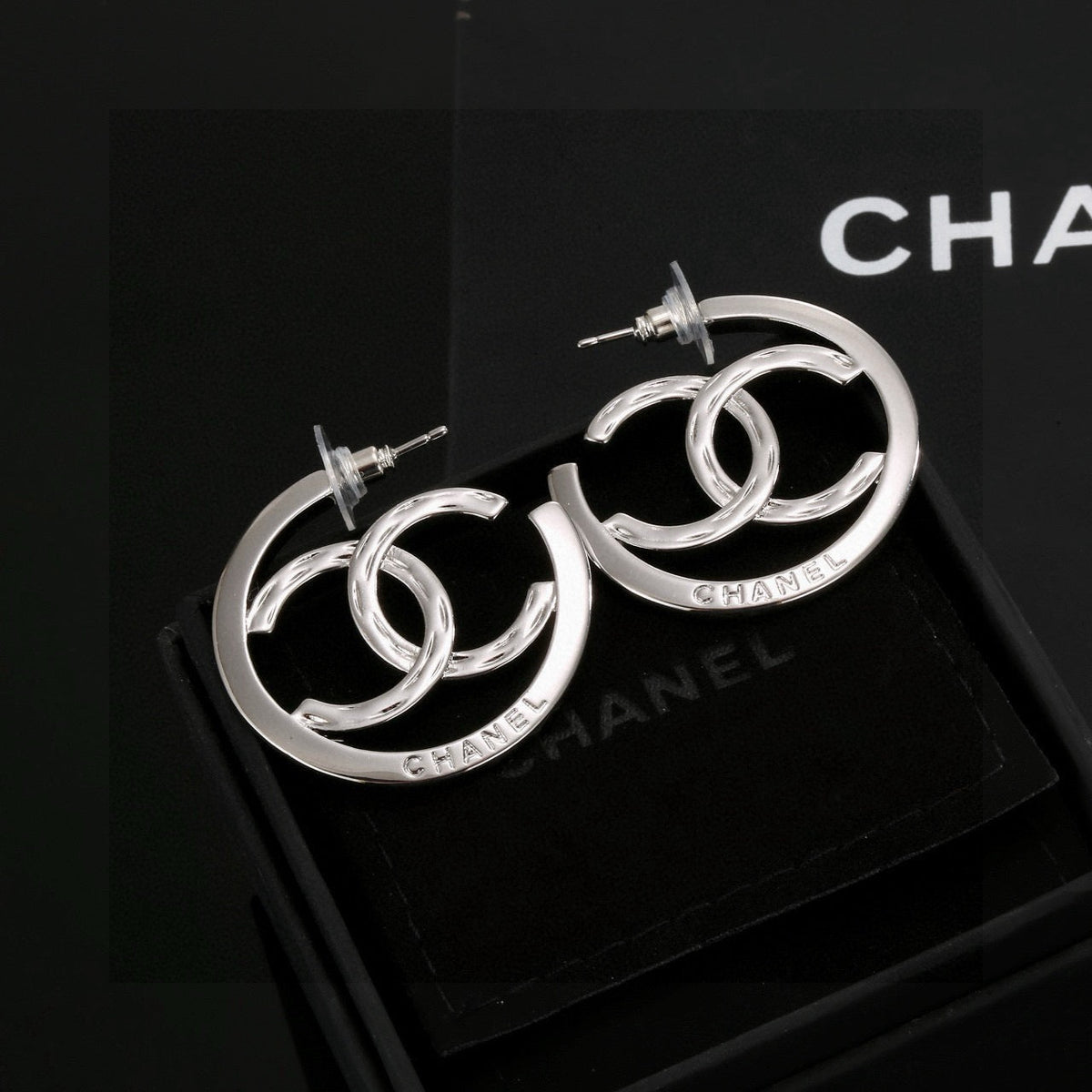 Martin Graham stud earrings in polished metal-tone – main product view