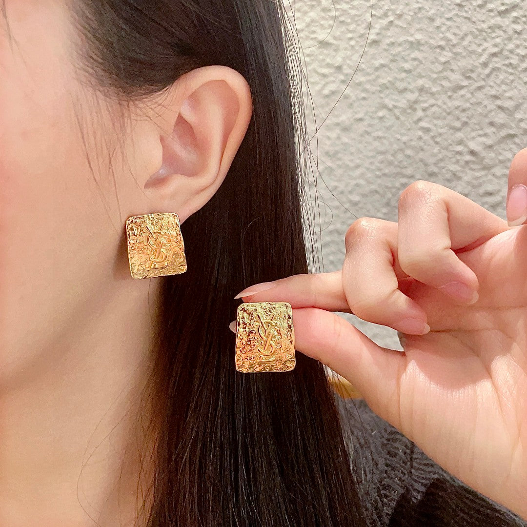 Martin Graham stud earrings in polished metal-tone – main product view