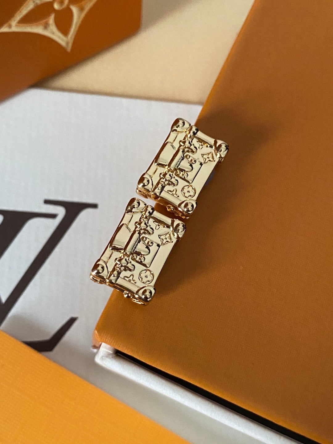 Martin Graham stud earrings in polished metal-tone – main product view