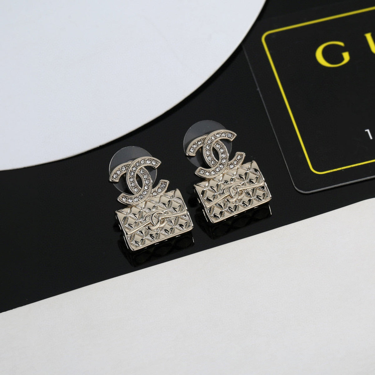 Martin Graham stud earrings in polished metal-tone – main product view