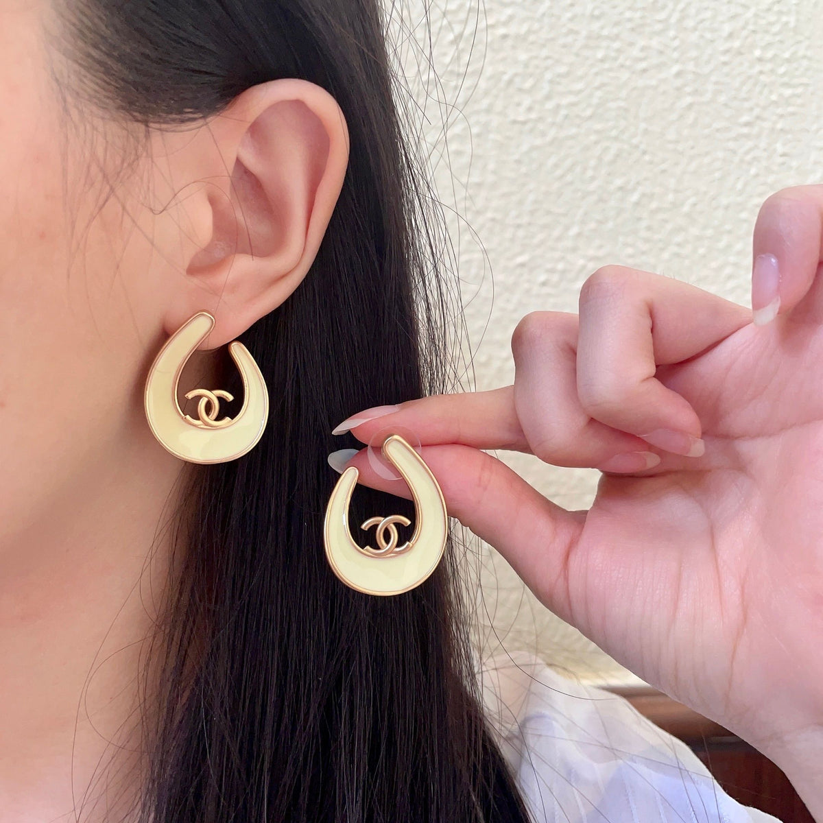 Martin Graham stud earrings in polished metal-tone – main product view
