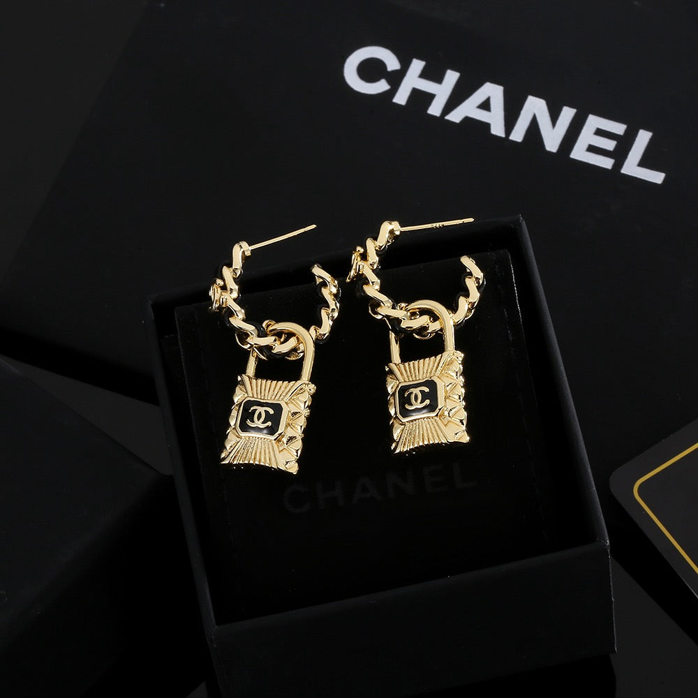 Martin Graham stud earrings in polished metal-tone – main product view