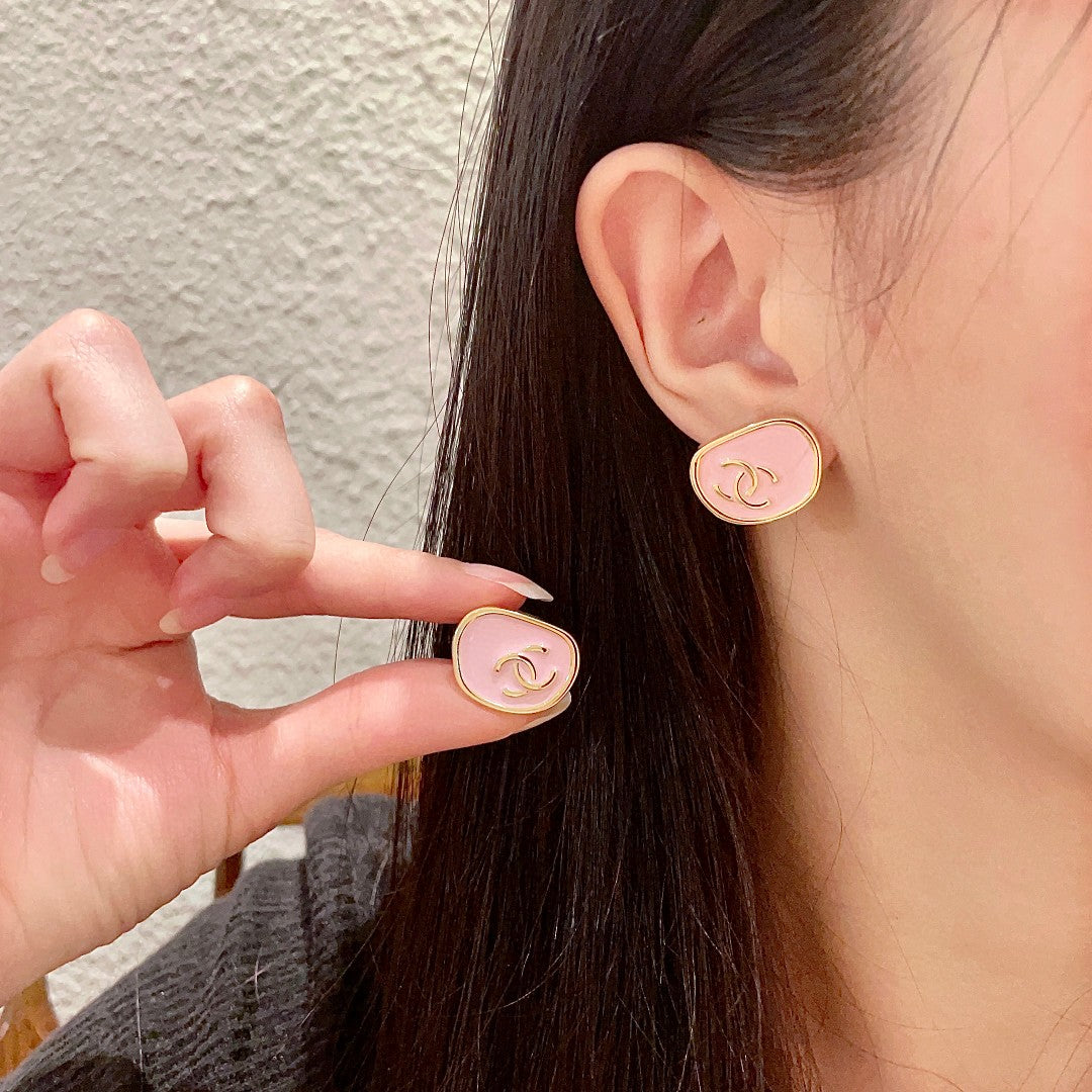 Martin Graham stud earrings in polished metal-tone – main product view