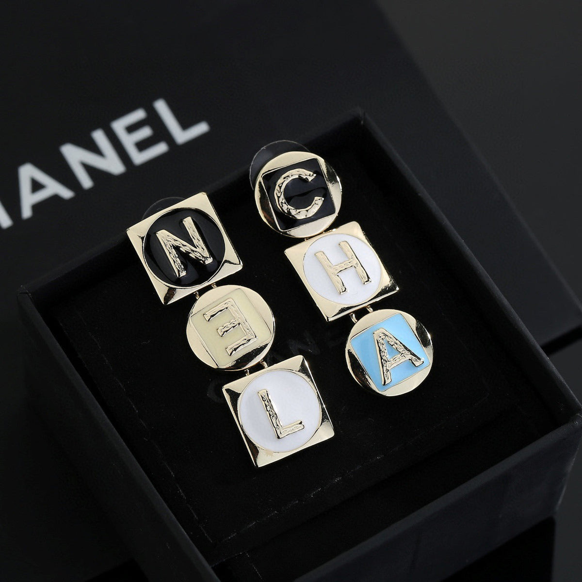 Martin Graham stud earrings in polished metal-tone – main product view
