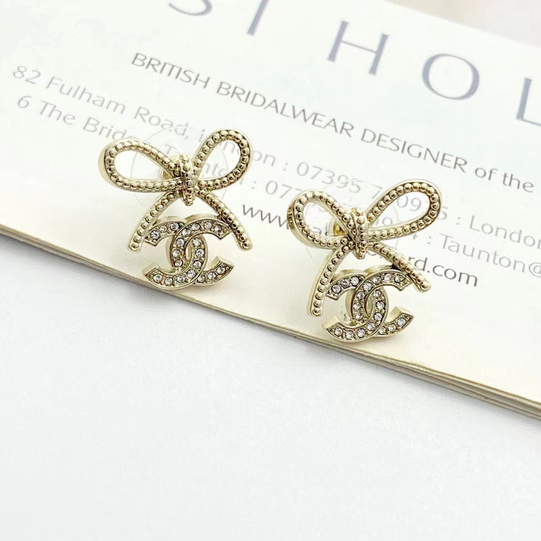 Martin Graham stud earrings in polished metal-tone – main product view