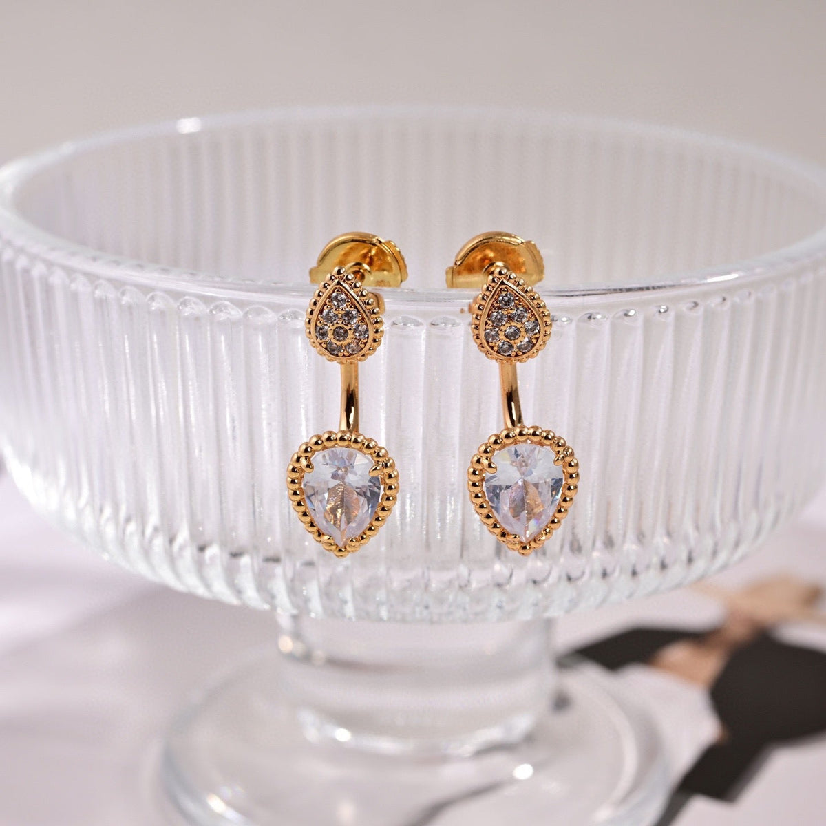 Martin Graham stud earrings in polished metal-tone – main product view