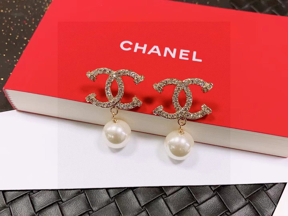 Martin Graham stud earrings in polished metal-tone – main product view
