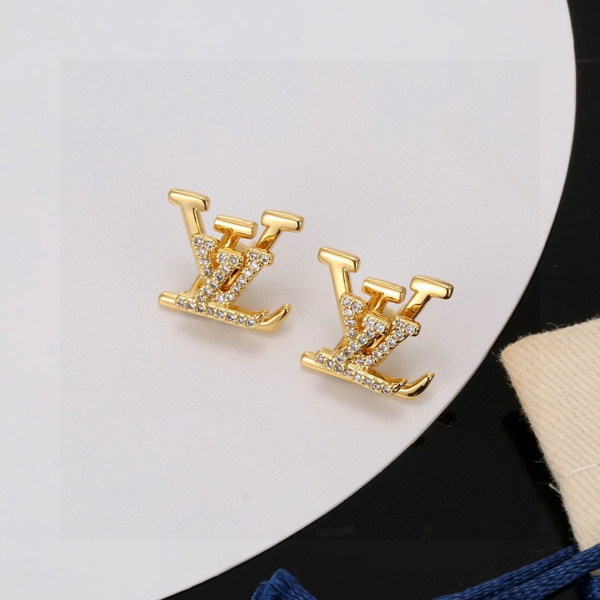 Martin Graham stud earrings in polished metal-tone – main product view