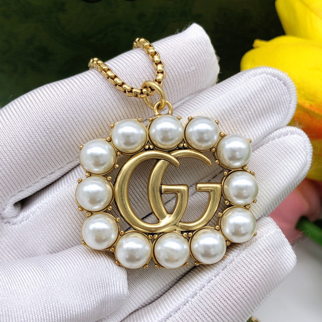 Martin Graham pendant necklace in polished metal-tone – main product view