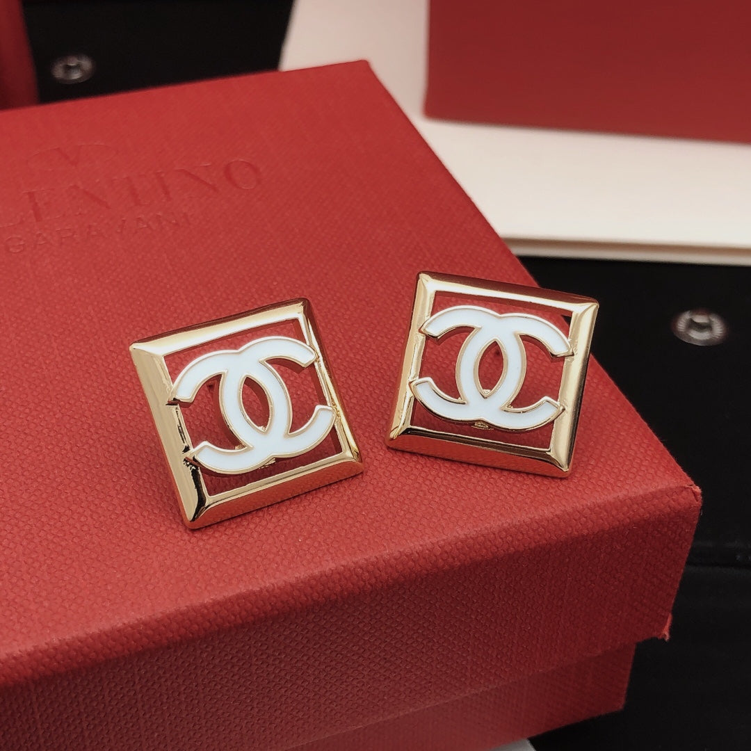 Martin Graham stud earrings in polished metal-tone – main product view