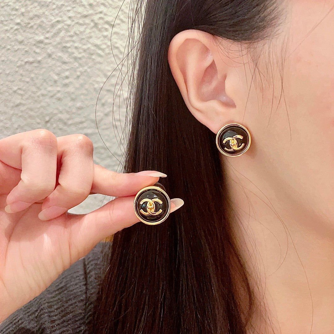 Martin Graham stud earrings in polished metal-tone – main product view