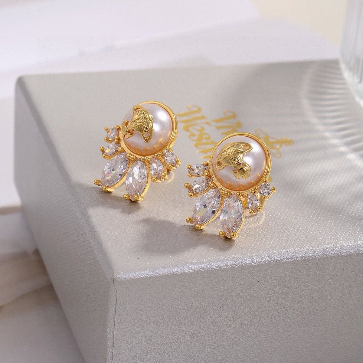Martin Graham stud earrings in polished metal-tone – main product view