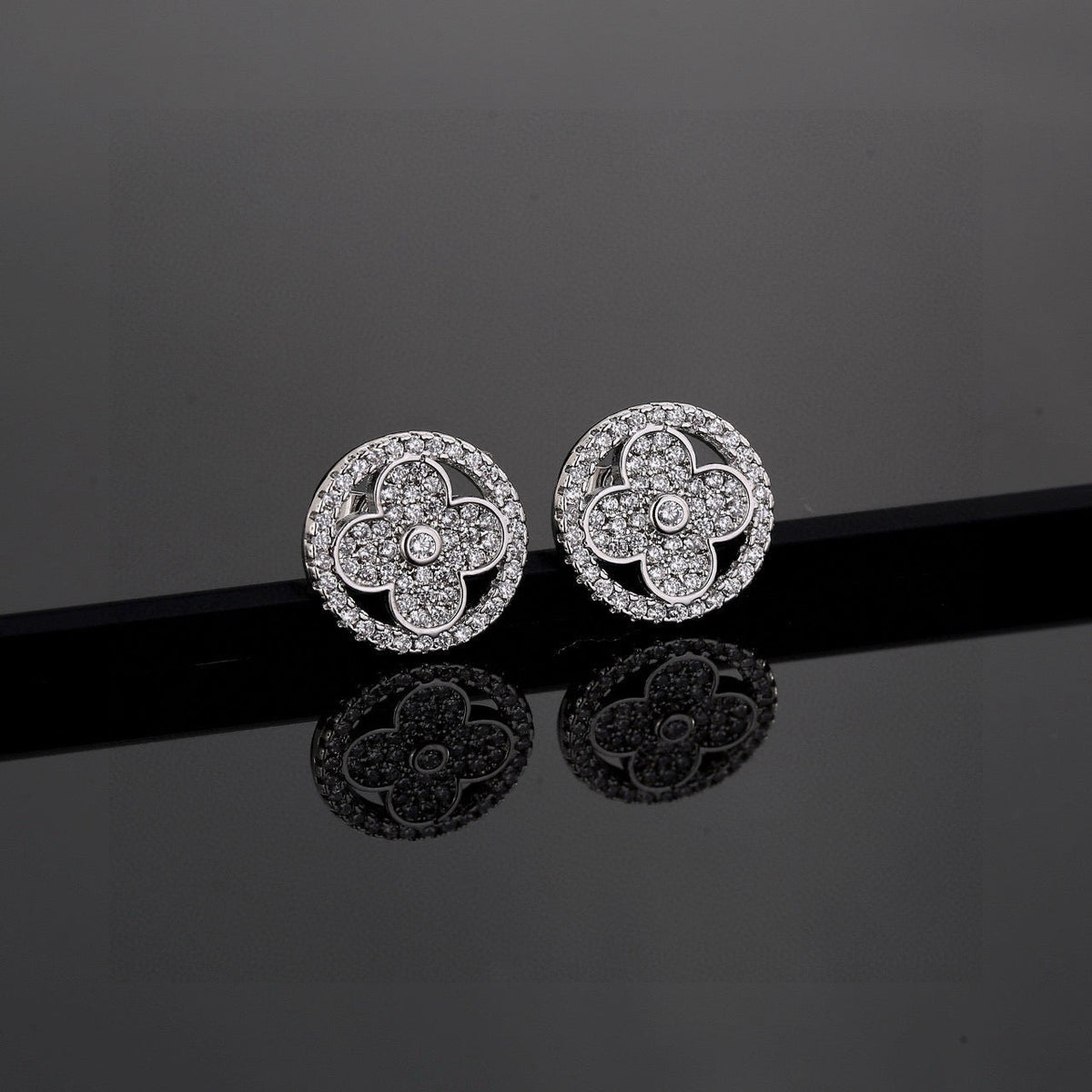 Martin Graham stud earrings in polished metal-tone – main product view