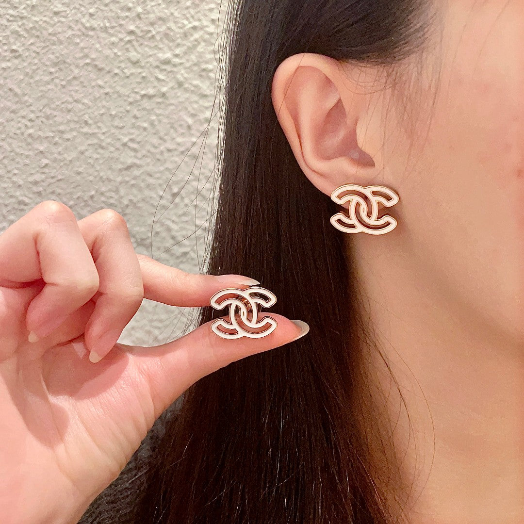 Martin Graham stud earrings in polished metal-tone – main product view