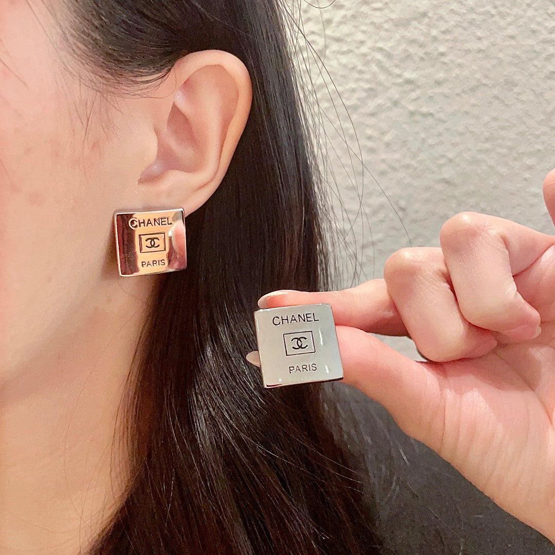 Martin Graham stud earrings in polished metal-tone – main product view