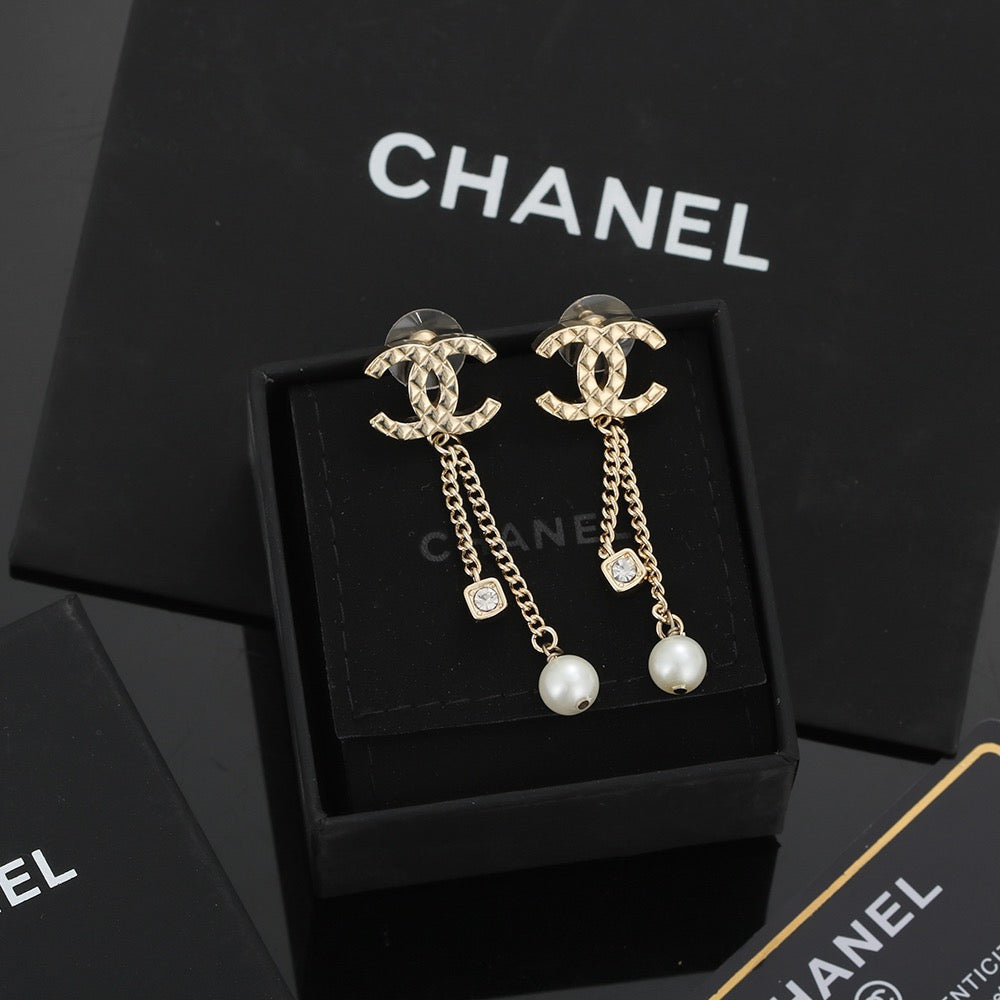 Martin Graham stud earrings in polished metal-tone – main product view