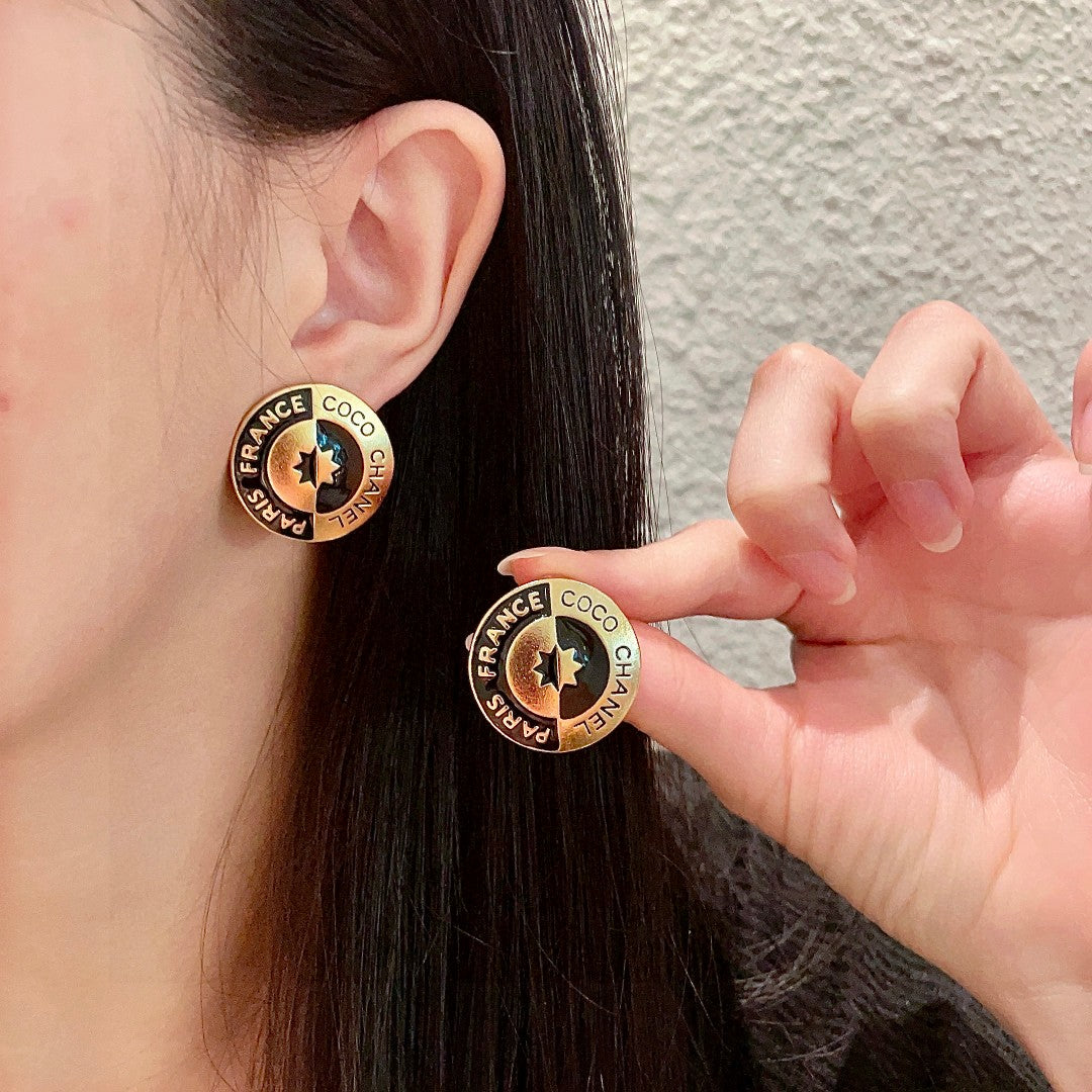 Martin Graham stud earrings in polished metal-tone – main product view