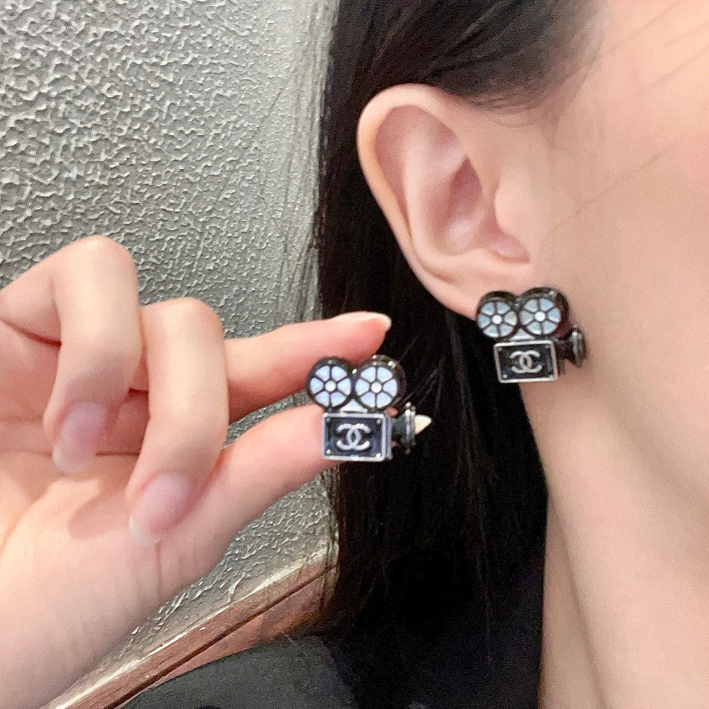 Martin Graham stud earrings in polished metal-tone – main product view