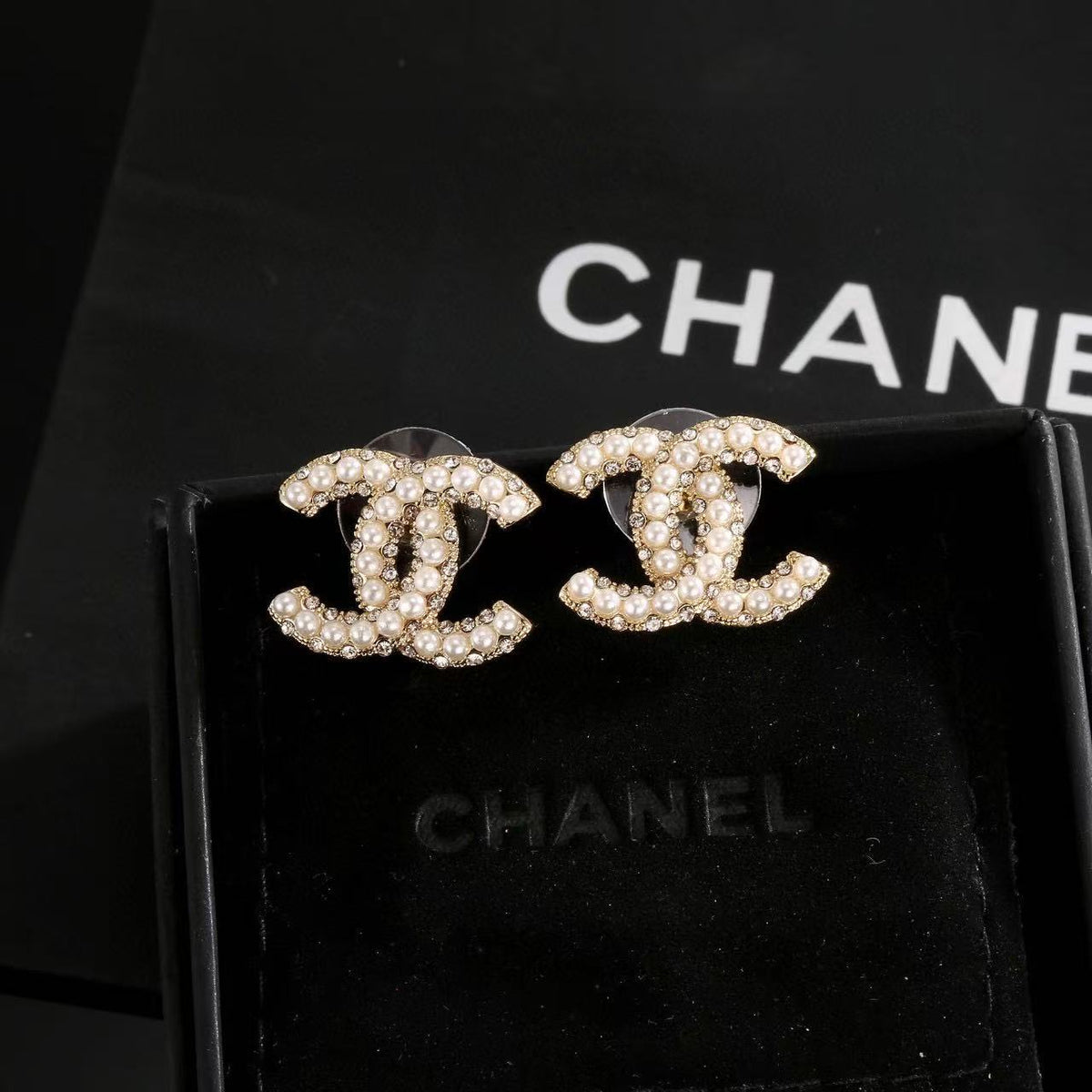 Martin Graham stud earrings in polished metal-tone – main product view