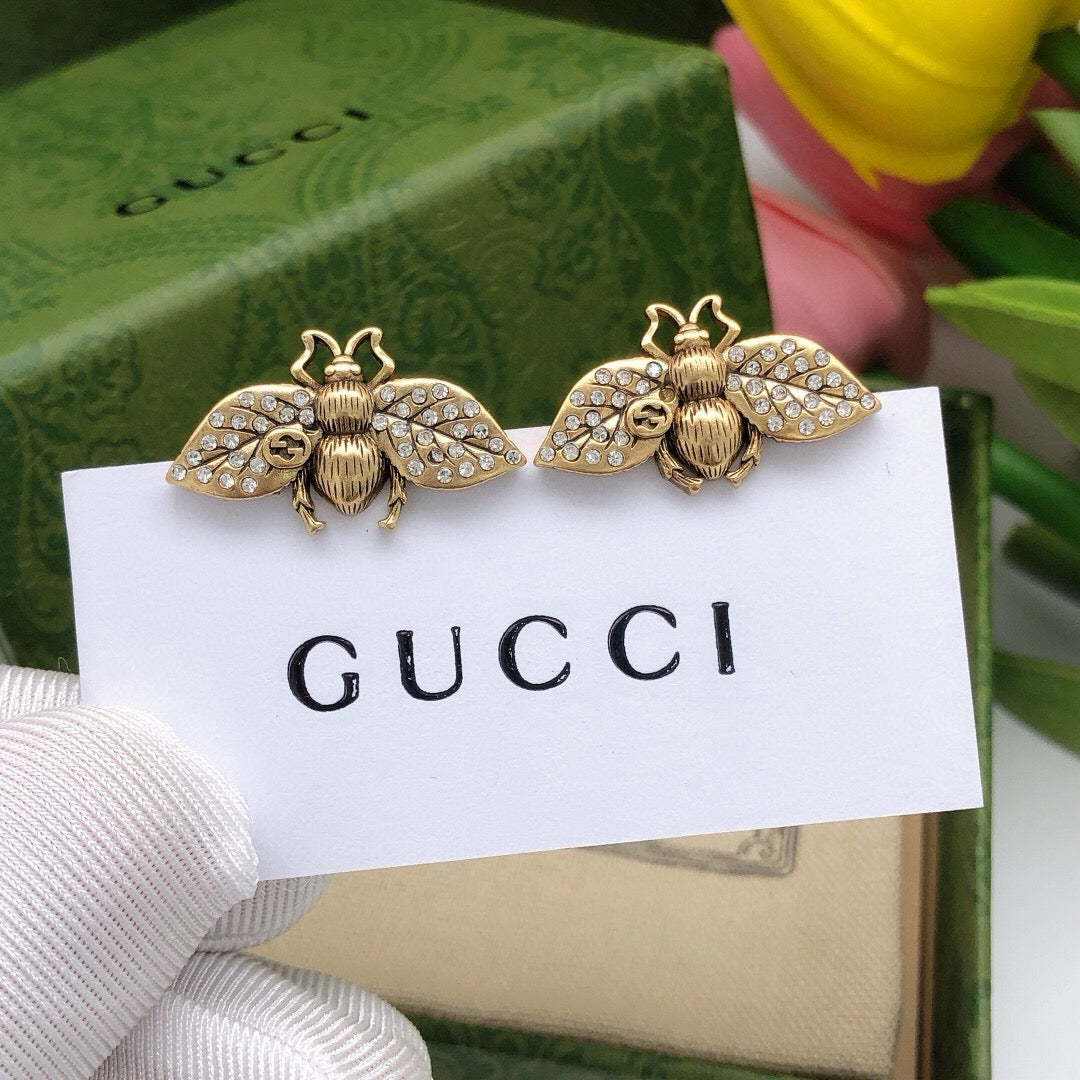 Martin Graham stud earrings in polished metal-tone – main product view