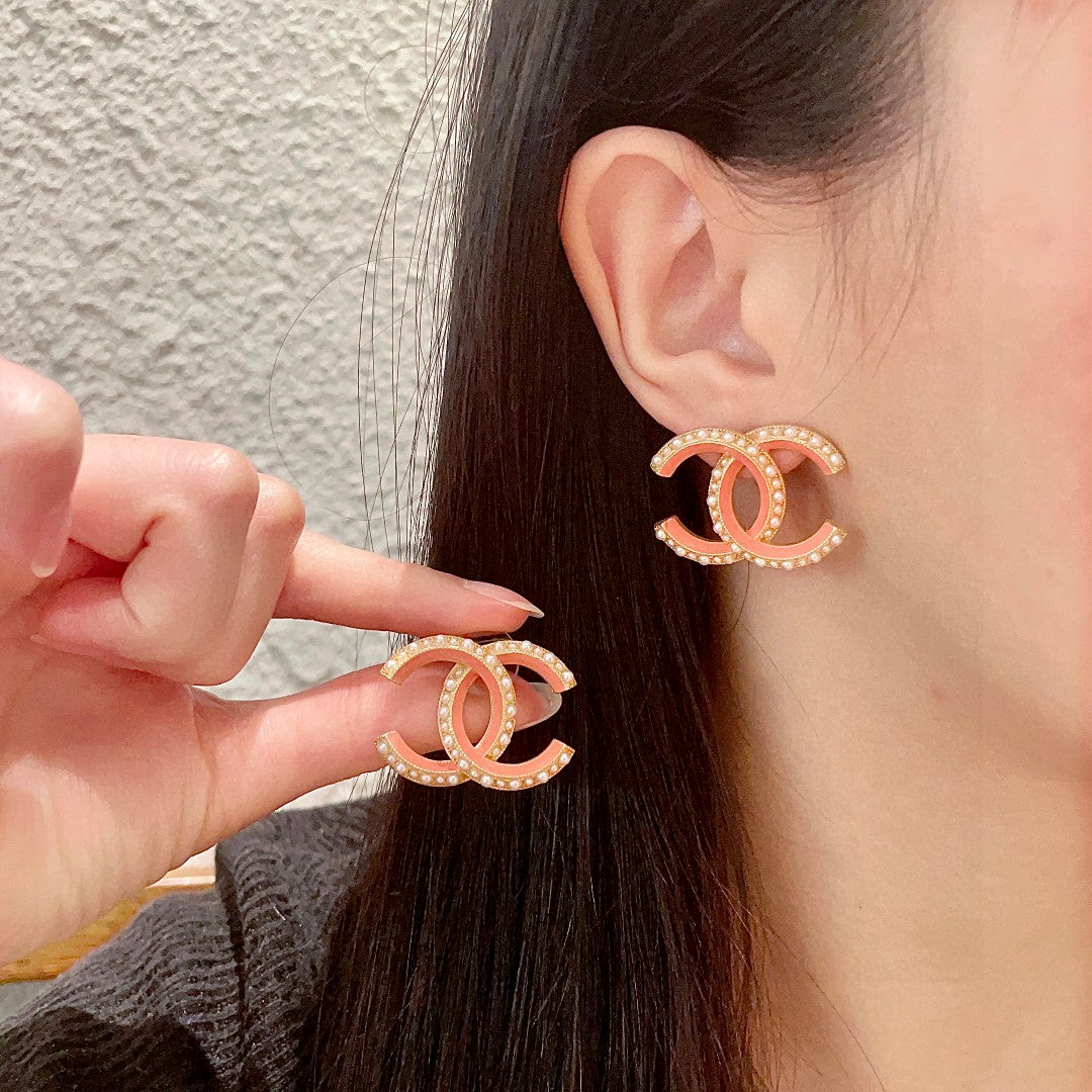 Martin Graham stud earrings in polished metal-tone – main product view