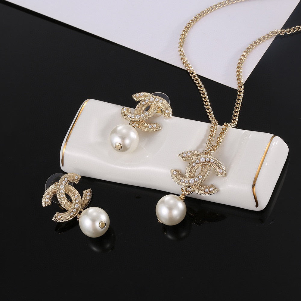 Martin Graham pendant necklace in polished metal-tone – main product view