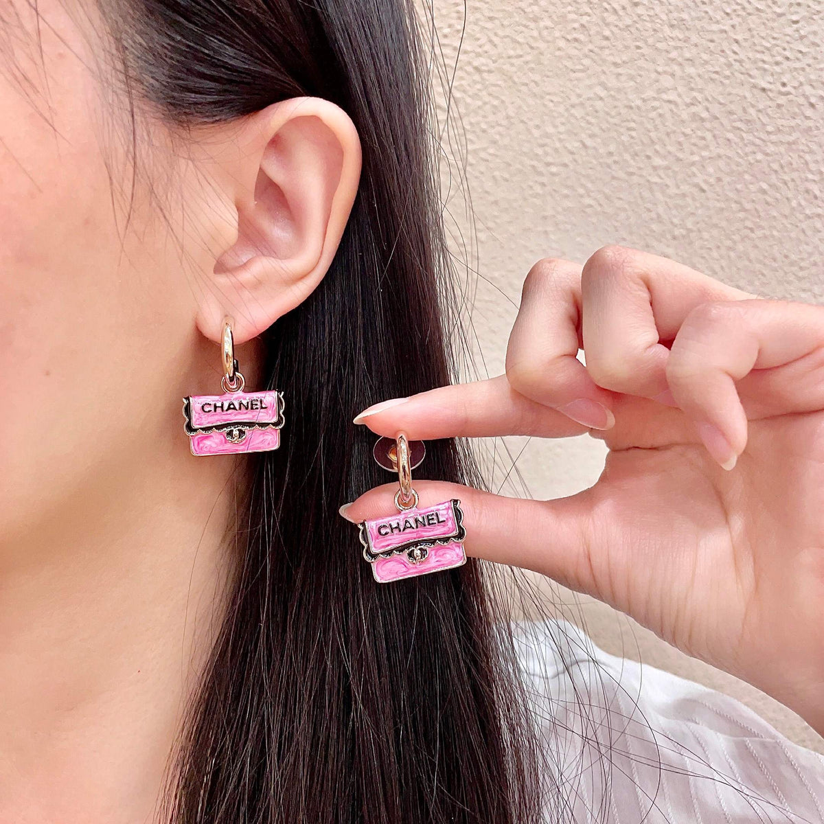 Martin Graham stud earrings in polished metal-tone – main product view