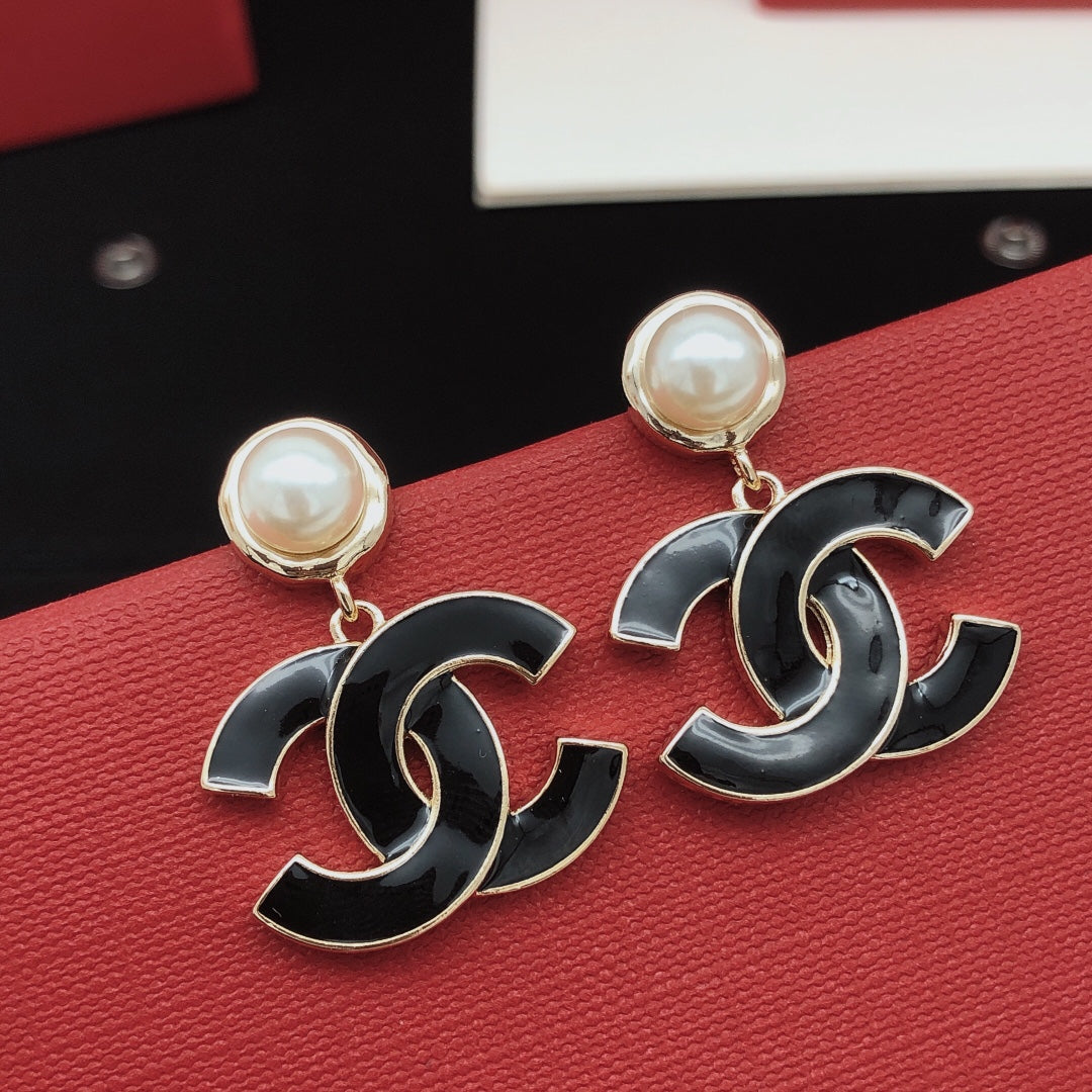 Martin Graham stud earrings in polished metal-tone – main product view