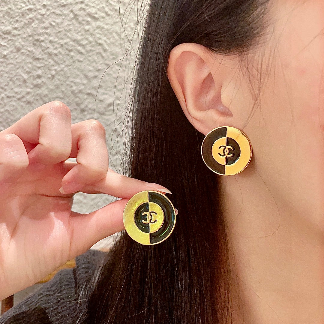 Martin Graham stud earrings in polished metal-tone – main product view