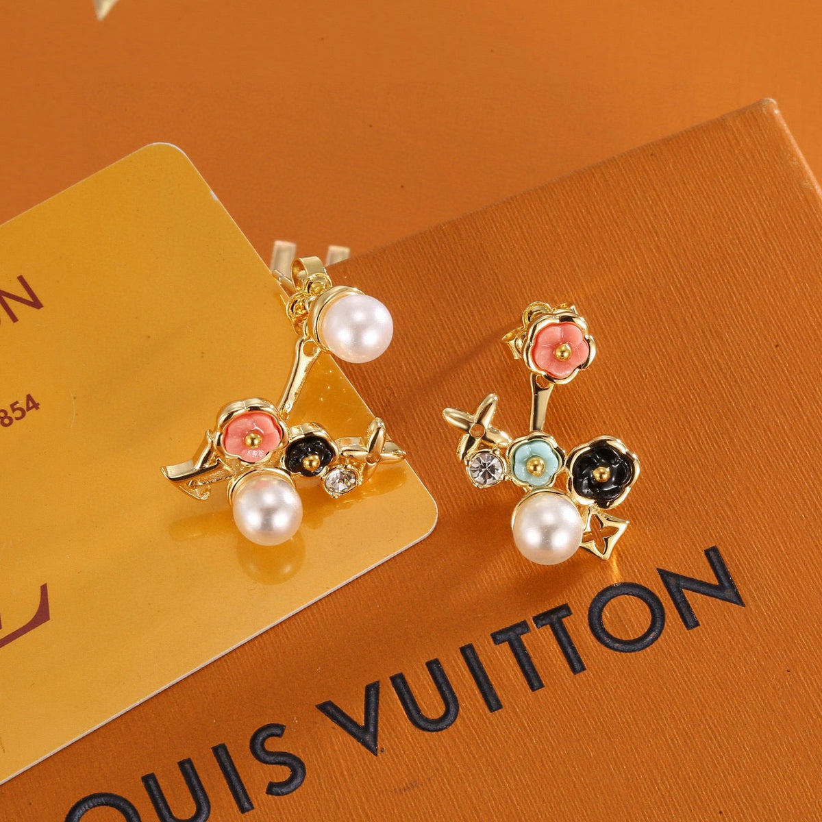 Martin Graham stud earrings in polished metal-tone – main product view
