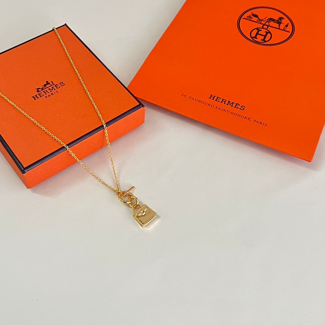 Martin Graham pendant necklace in polished metal-tone – main product view
