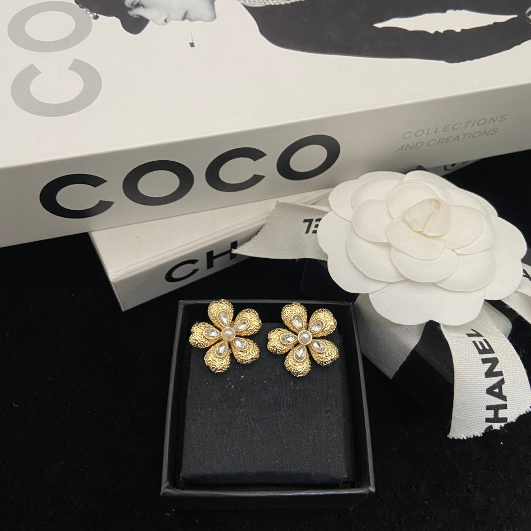 Martin Graham stud earrings in polished metal-tone – main product view