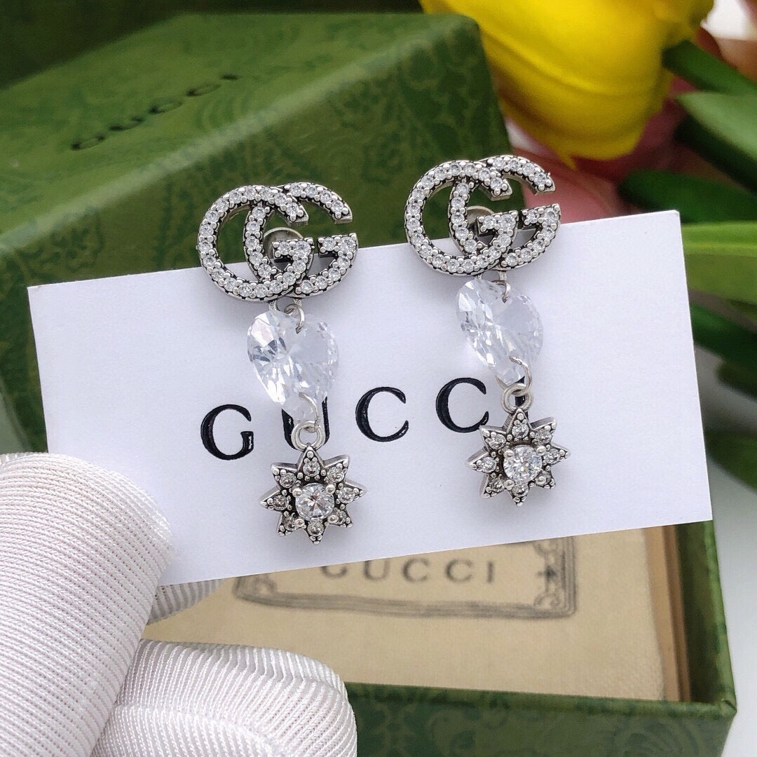Martin Graham stud earrings in polished metal-tone – main product view