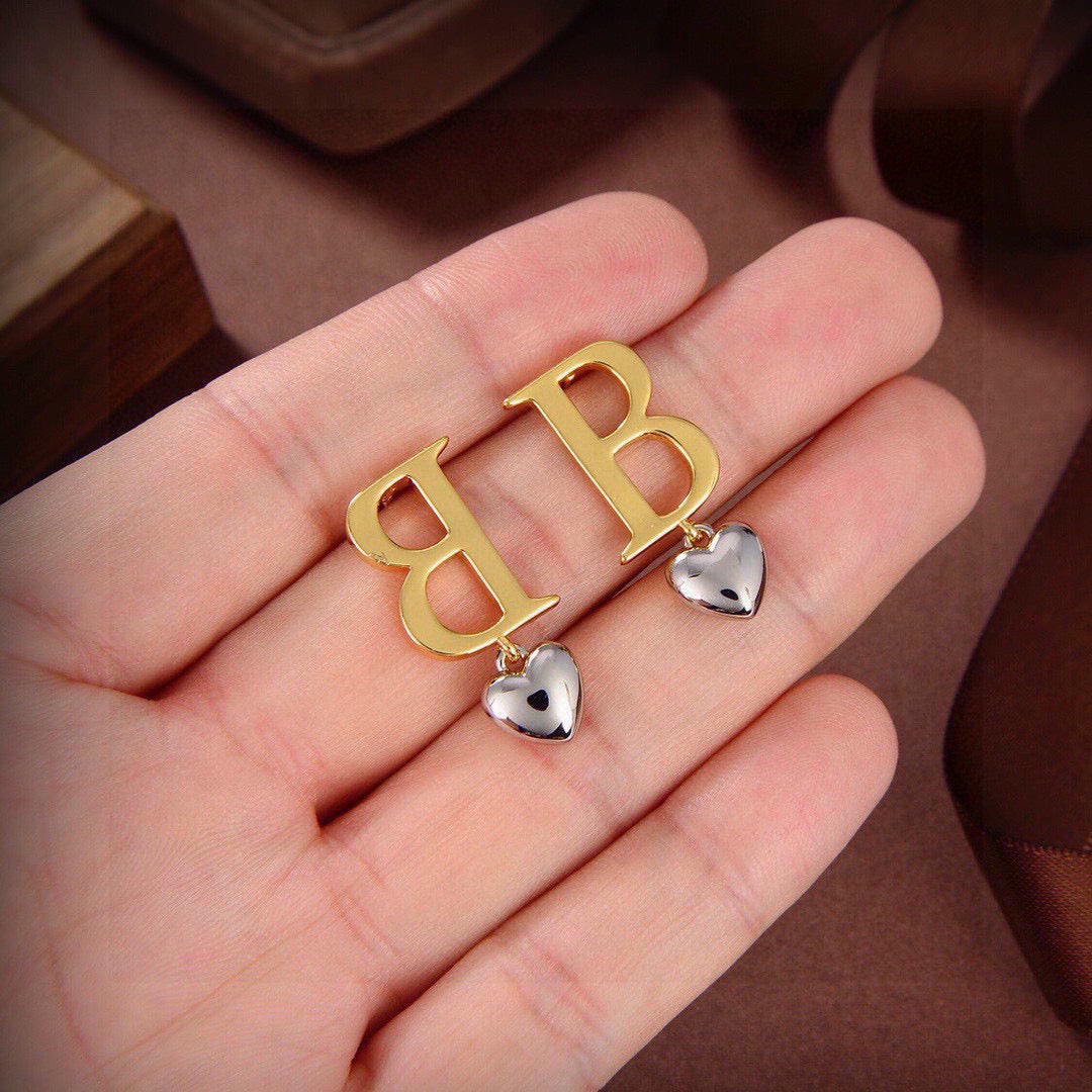 Martin Graham stud earrings in polished metal-tone – main product view