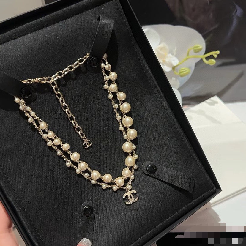 Martin Graham pendant necklace in polished metal-tone – main product view