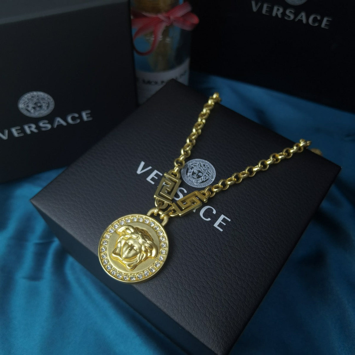 Martin Graham pendant necklace in polished metal-tone – detail view