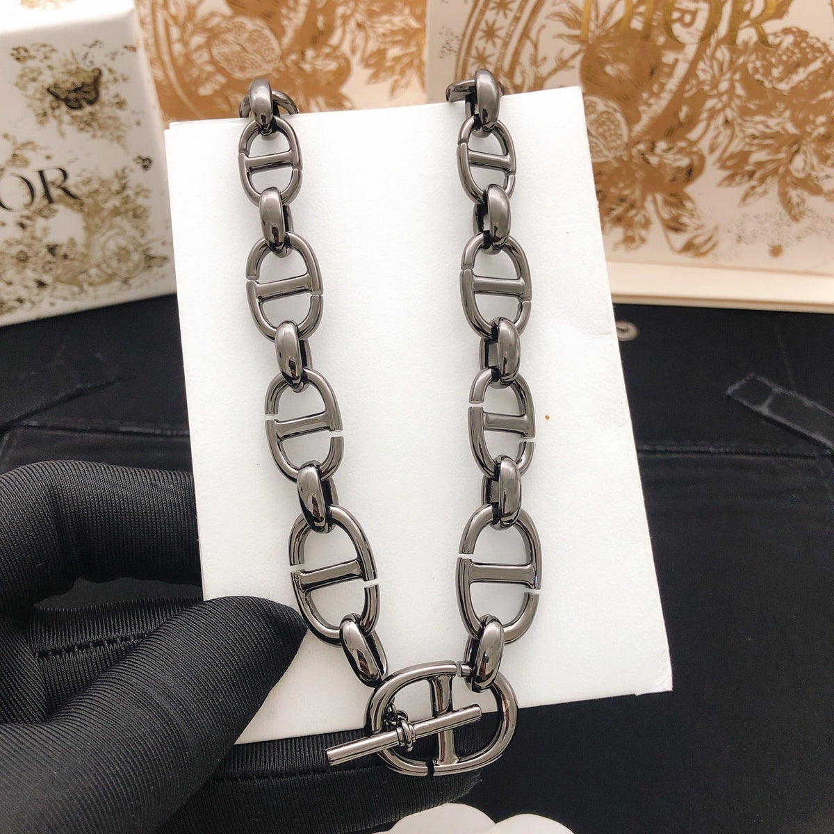 Martin Graham pendant necklace in polished metal-tone