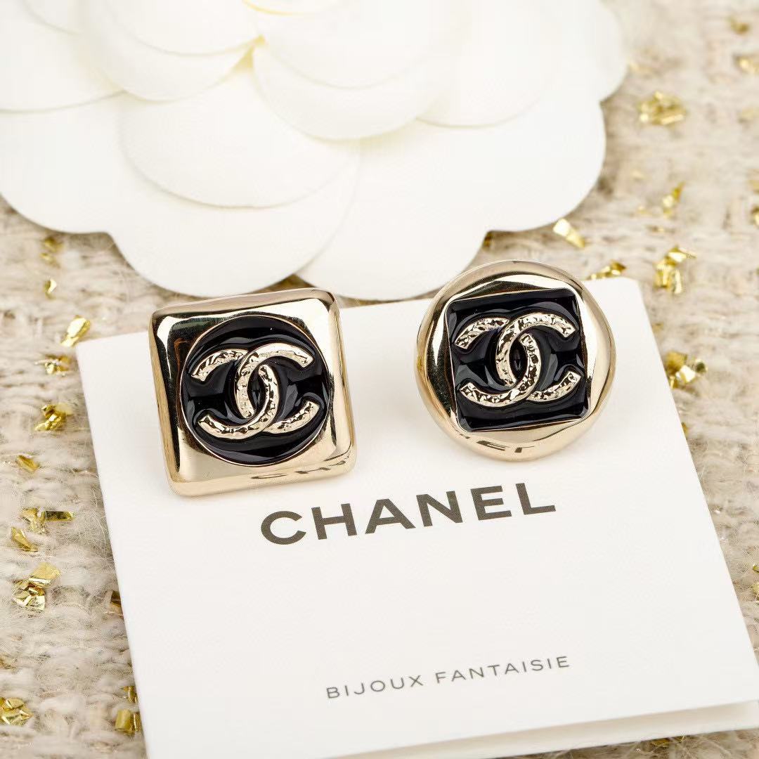 Martin Graham stud earrings in polished metal-tone – styled product view