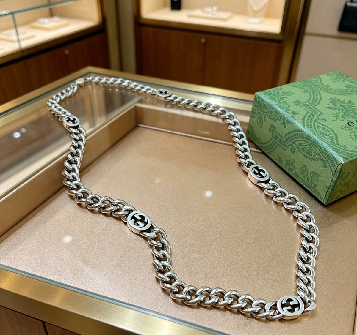 Martin Graham pendant necklace in polished metal-tone – front product view