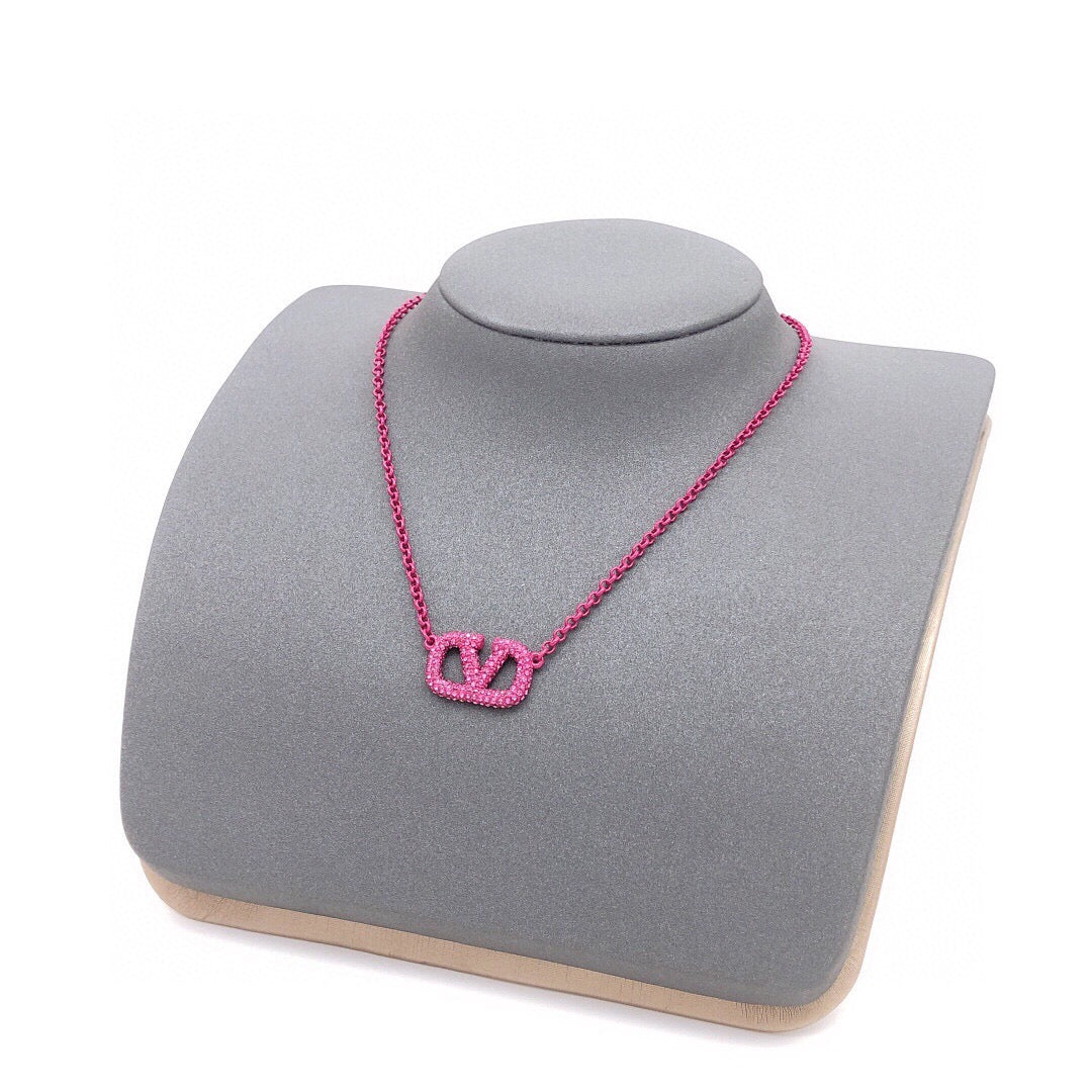 Martin Graham pendant necklace in polished metal-tone