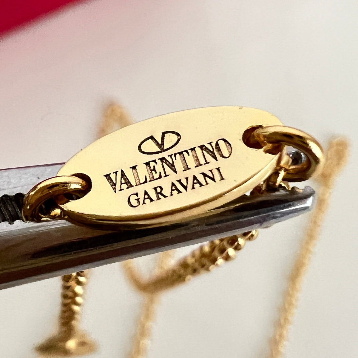Martin Graham pendant necklace in polished metal-tone