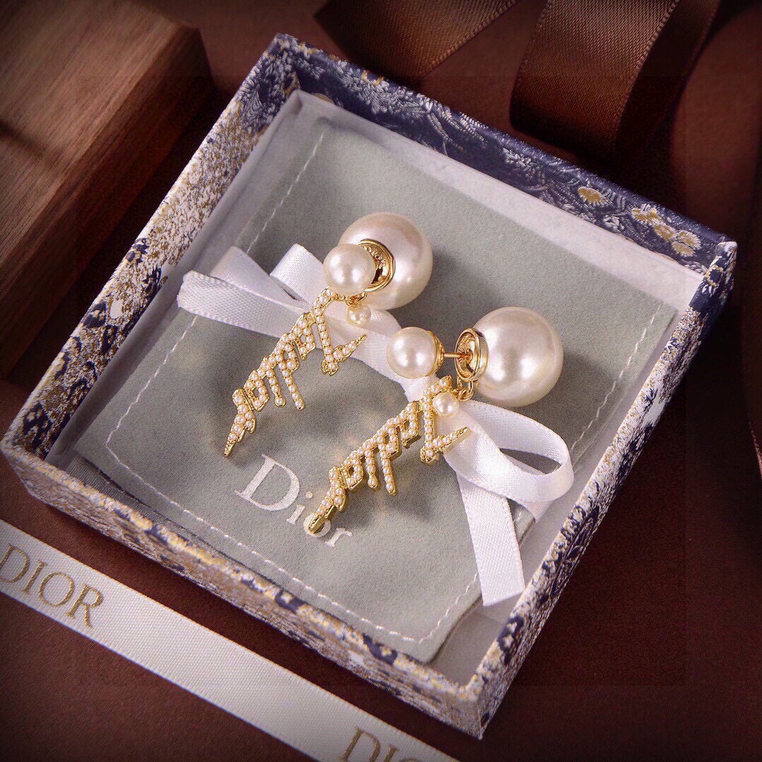 Martin Graham earrings in polished metal-tone – close-up detail