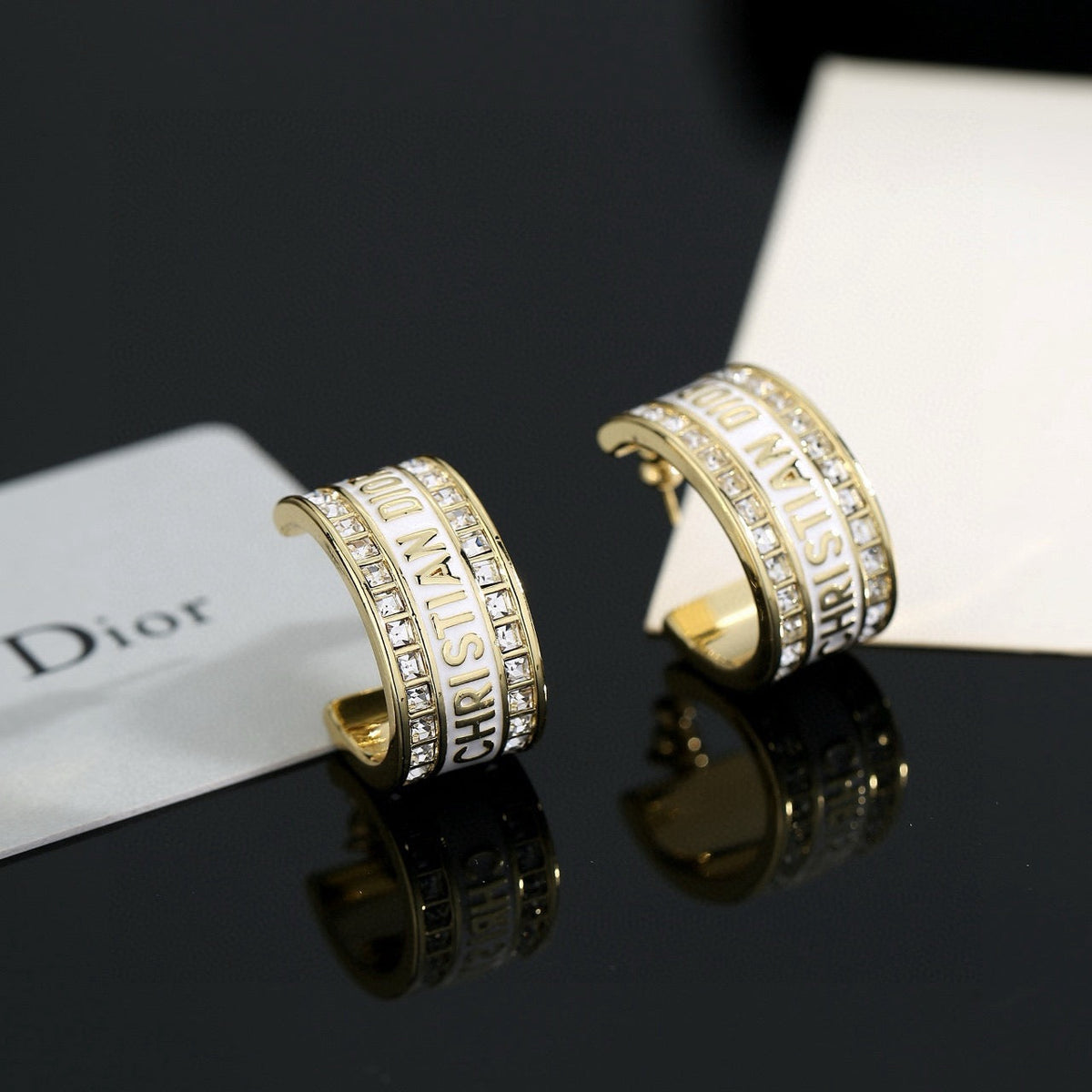 Martin Graham earrings in polished metal-tone – front view