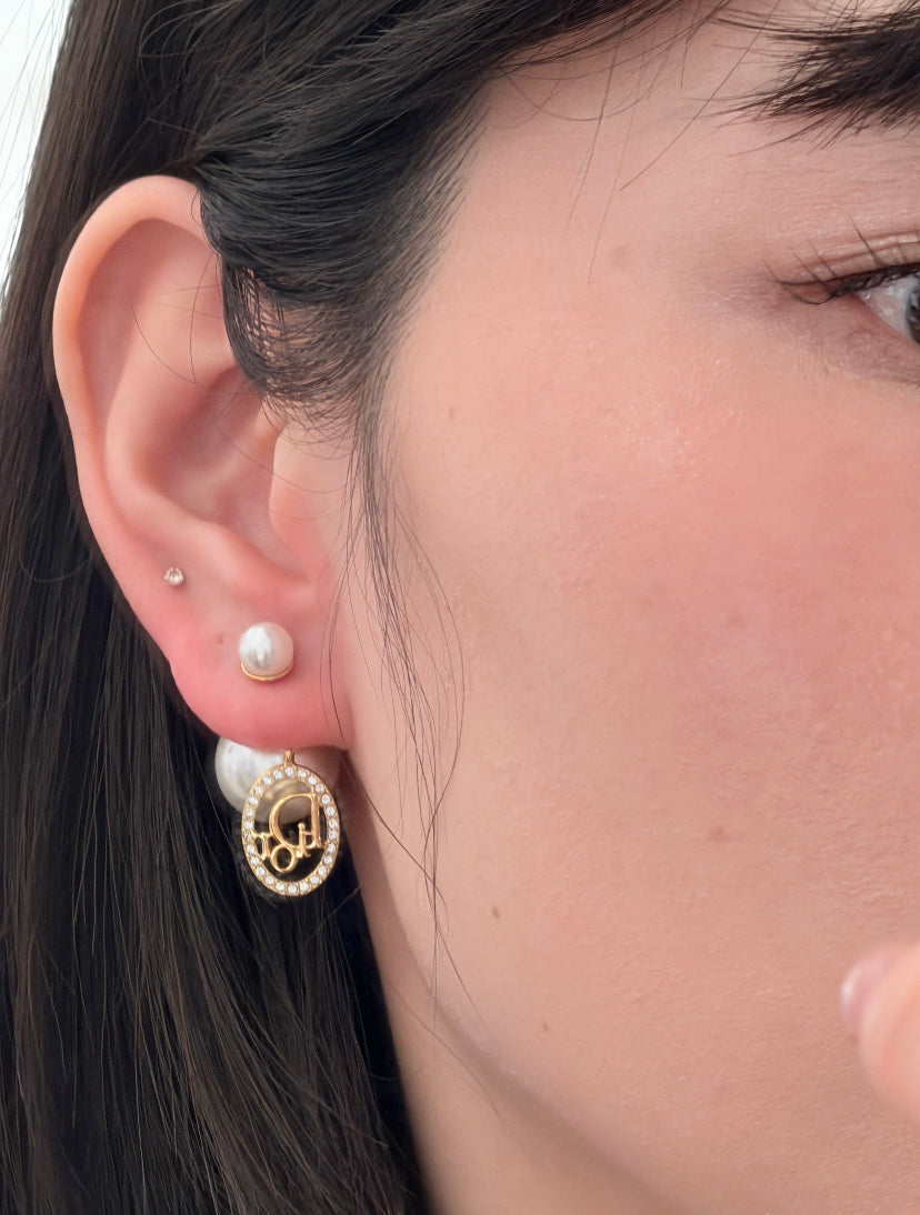 Martin Graham stud earrings in polished metal-tone – front view
