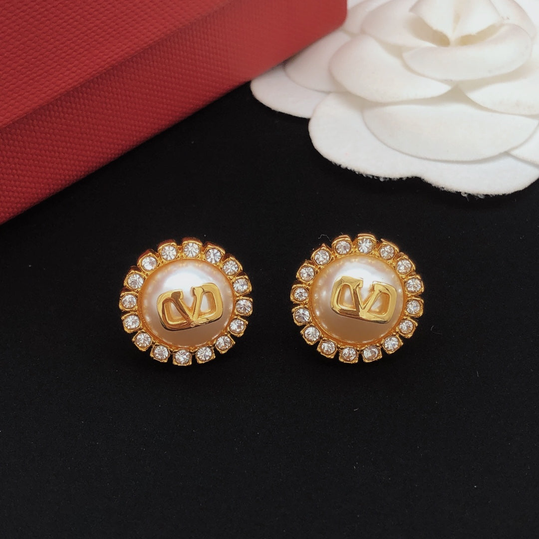 Martin Graham stud earrings in polished metal-tone – front view