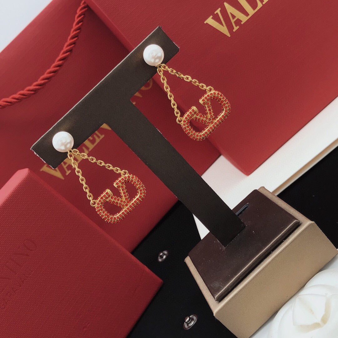Martin Graham stud earrings in polished metal-tone – front view