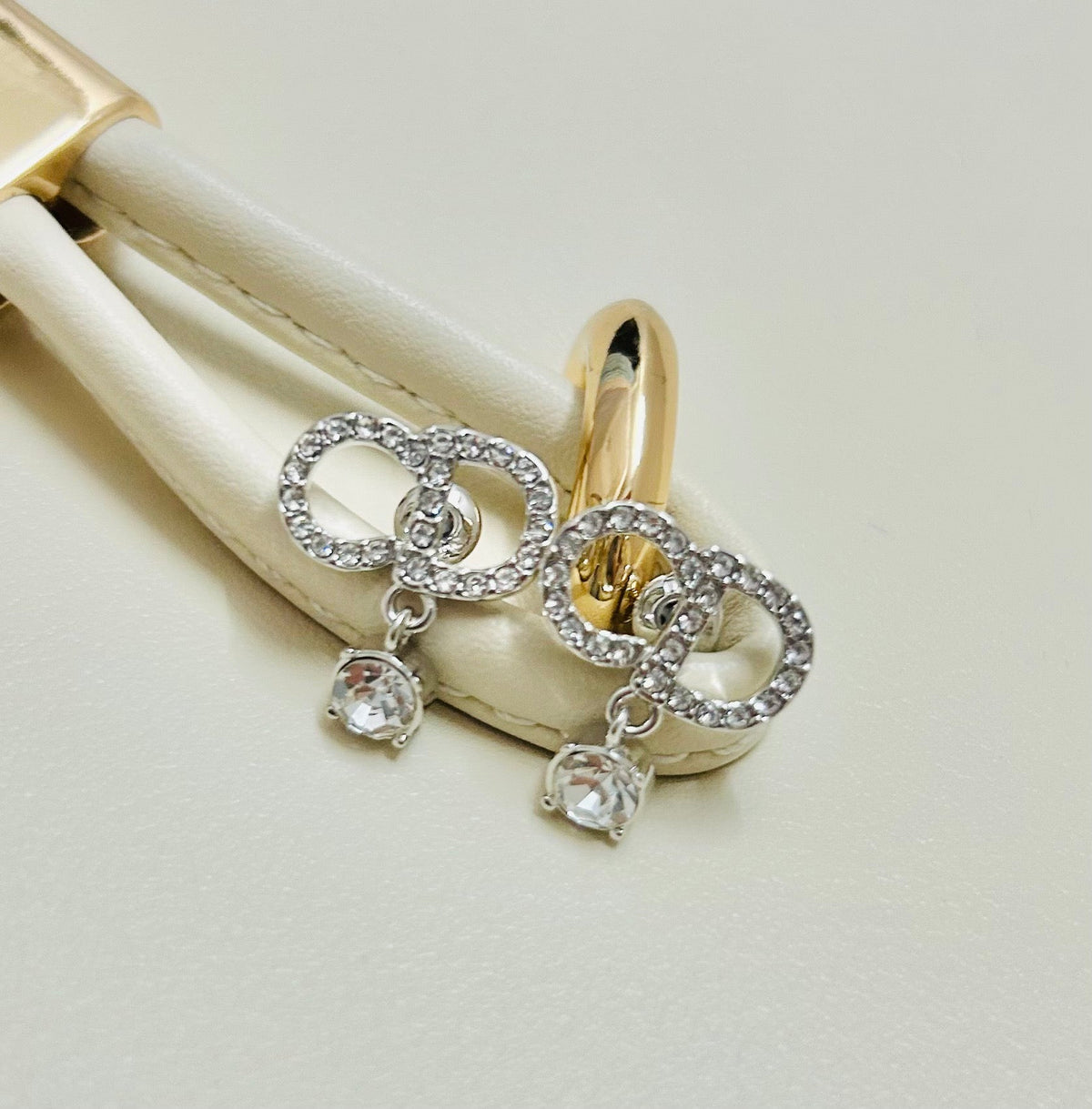 Martin Graham earrings in polished metal-tone – front view
