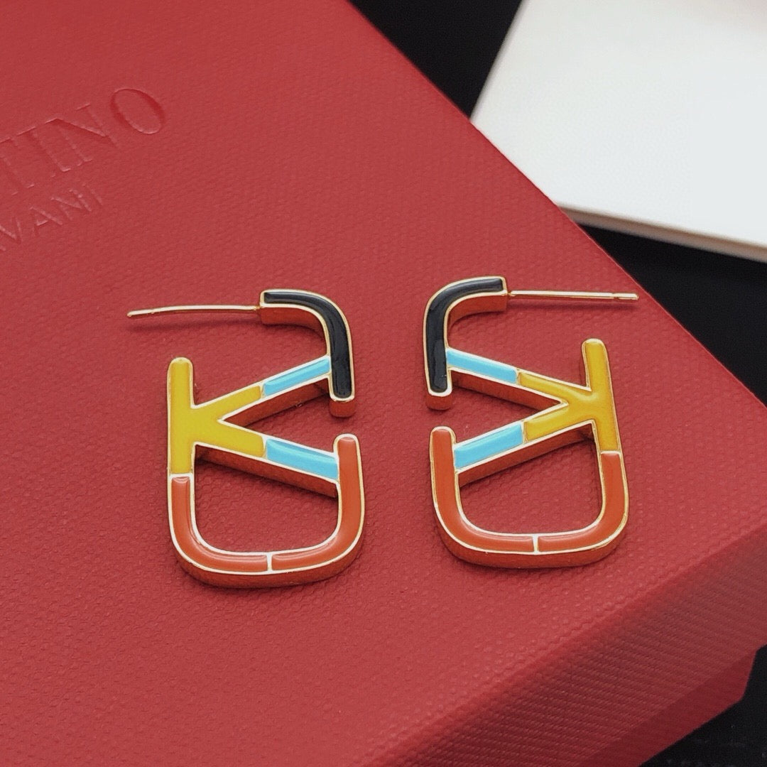 Martin Graham stud earrings in polished metal-tone – detail view